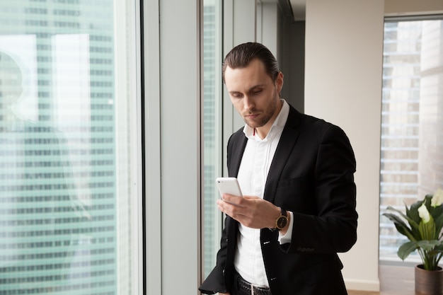 Serious young handsome businessman 