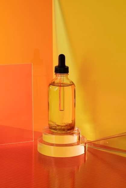 Serum bottle with yellow background