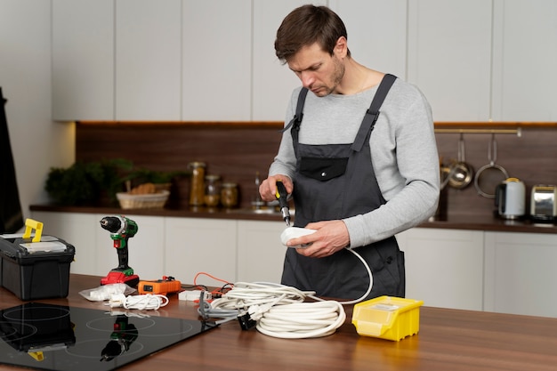 Service maintenance worker repairing