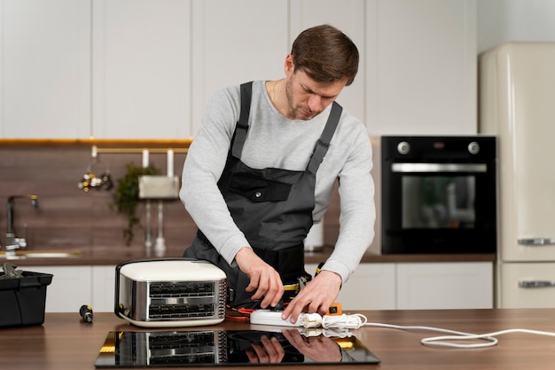 Service maintenance worker repairing