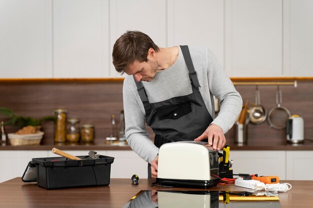 Service maintenance worker repairing