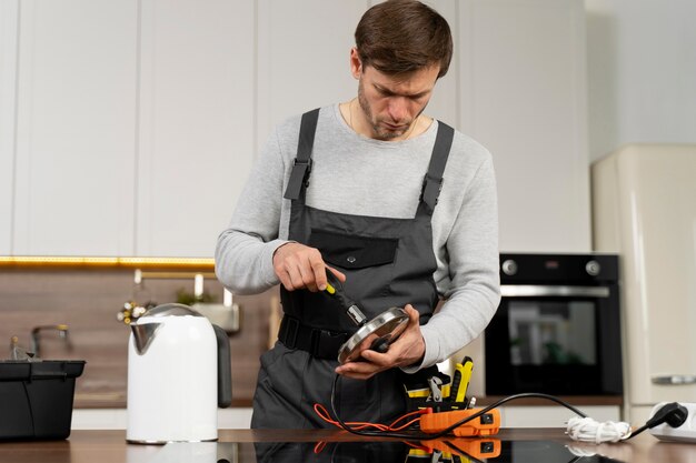 Service maintenance worker repairing