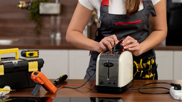 Service maintenance worker repairing