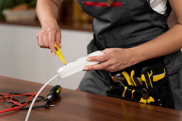 Service maintenance worker repairing