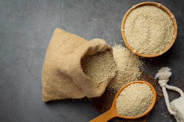 Sesame seeds on dark background