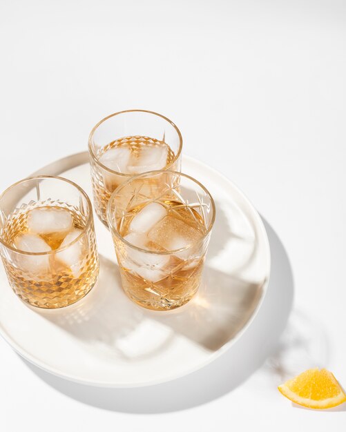 Set of alcoholic drinks on plain background