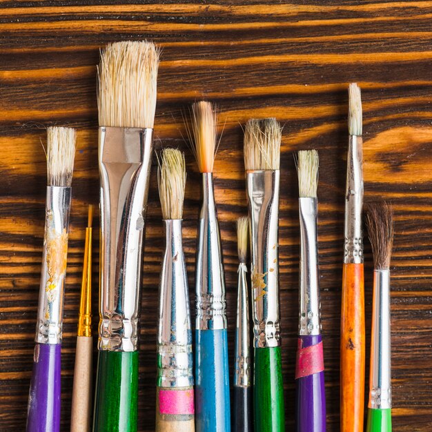 Set of brushes on table