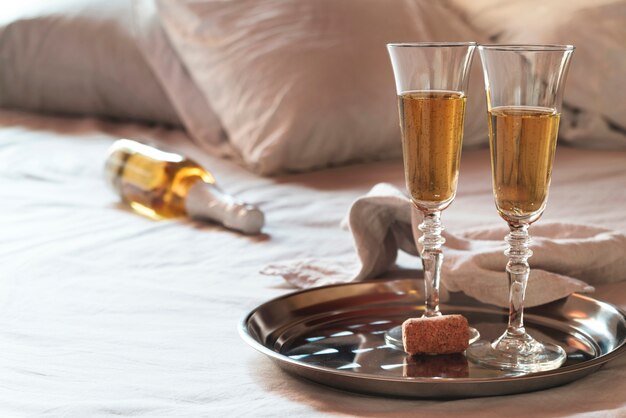 Set of champagne glasses on a tray