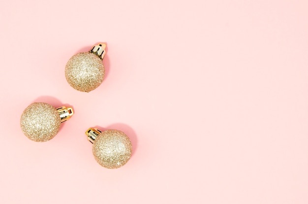 Set of christmas balls with pink background