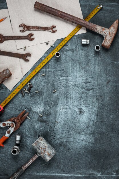 Set of construction tools on wooden table