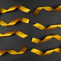 Free photo set of curling golden ribbons