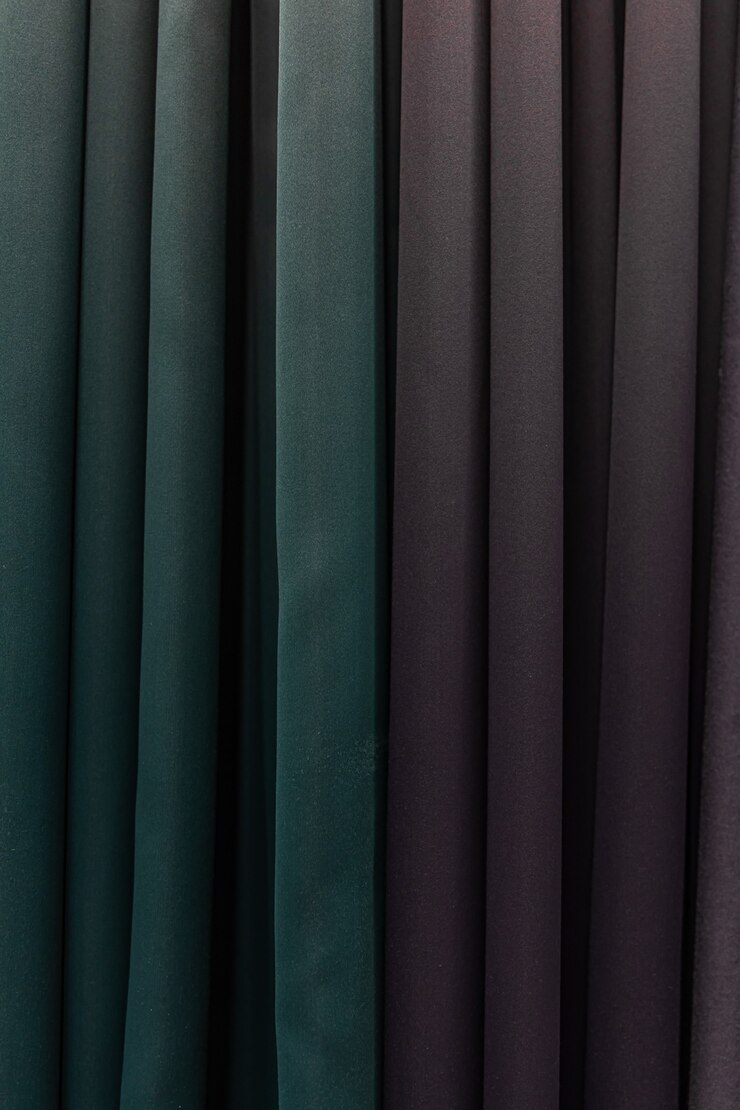 Free Photo set of dark multi-colored dense fabrics of uniform texture, choice of materials in different colors.
