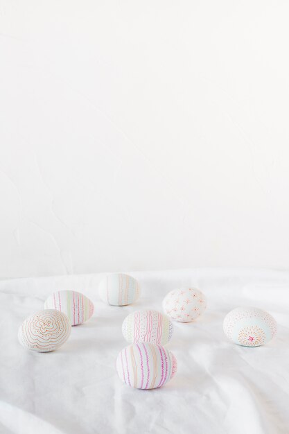 Set of Easter eggs on light textile
