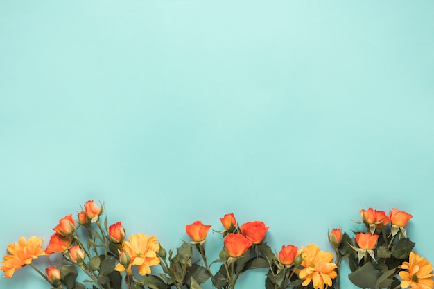 Set of fresh flowers with green leaves