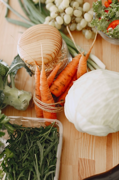 Set of fresh raw vegetables. Products on a table in a modern kitchen room. Healthy Eating. Organic food.