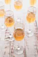 Free photo set of glasses with champagne on the table