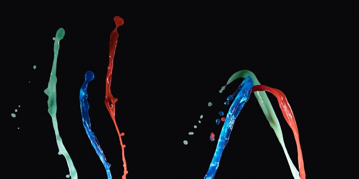 Free Photo set of green, red, and blue liquid splashing over dark backdrop