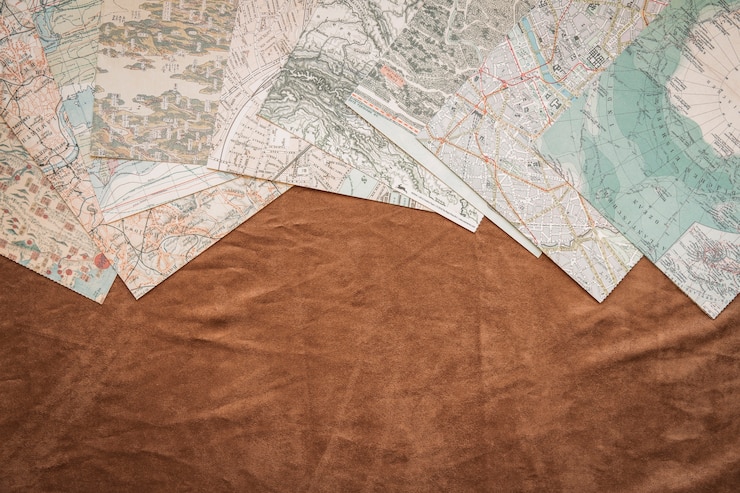 Free Photo set of maps on table