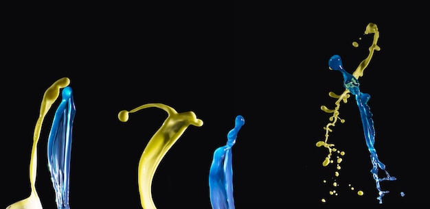 無料写真 黒の背景にスプラッシュの黄色と青の水のセット