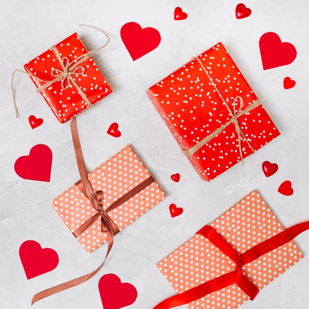 Set of present boxes and ornament hearts 