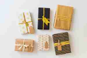 Free photo set of present boxes in wraps with labels