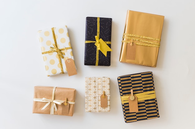 Set of present boxes in wraps with labels