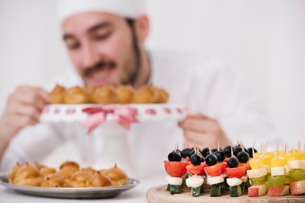 Set of snacks on a wooden board