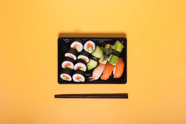 Set of sushi near chopsticks