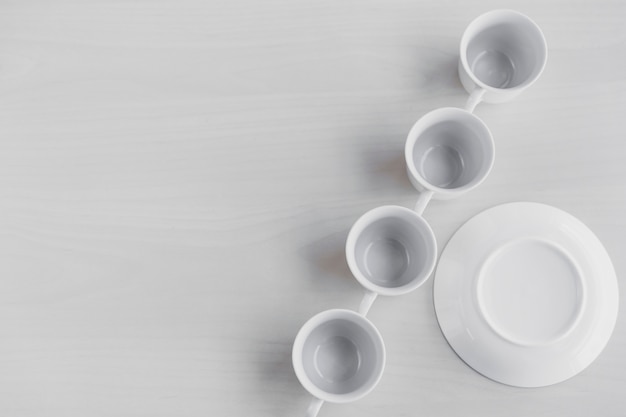 Set of teacups near saucer