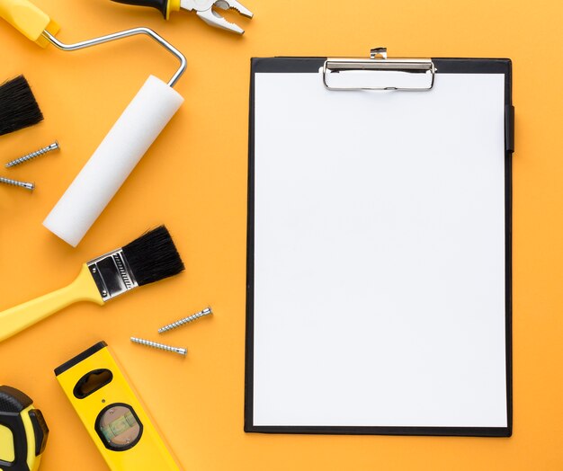 Set of tools and empty clipboard with copy space