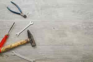 Free photo set of tools on wooden surface