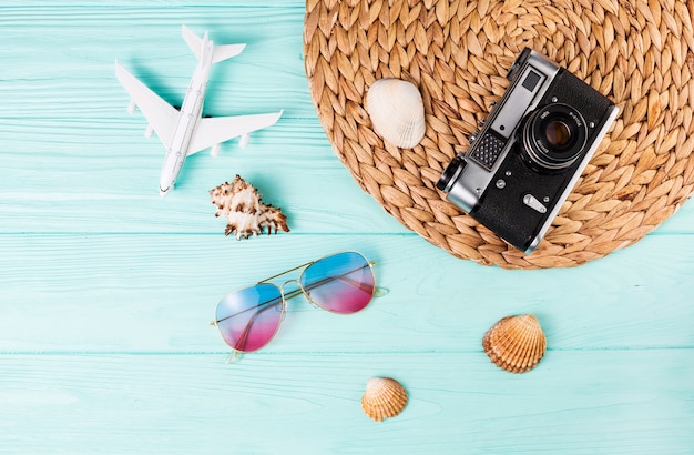 Set of travelling souvenirs and photo camera