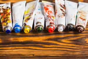 Free photo set of tubes with colorful paints