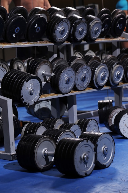 Free photo a set up with many dumbbells