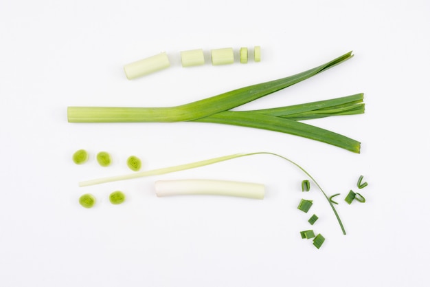 Set of whole and sliced fresh green chives