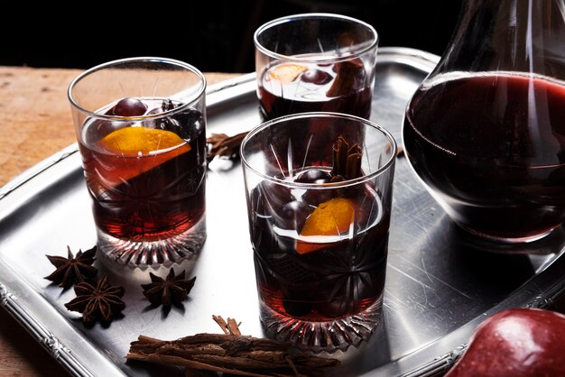 Set of wine glasses with carafe on a tray