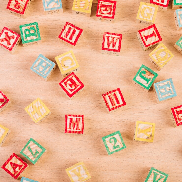 Free Photo set of wooden bright cubes on floor