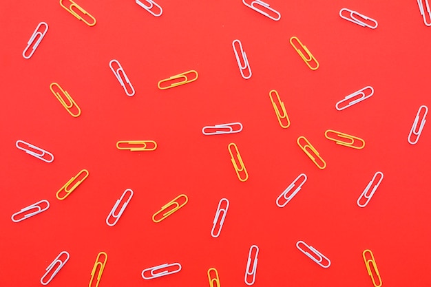 Set of yellow and white paper clips