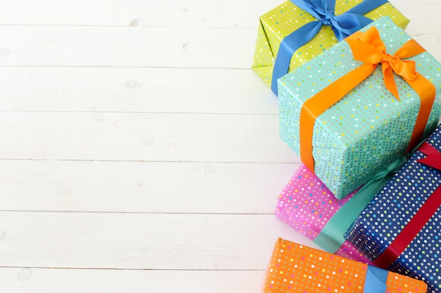 Several colorful gifts with bow