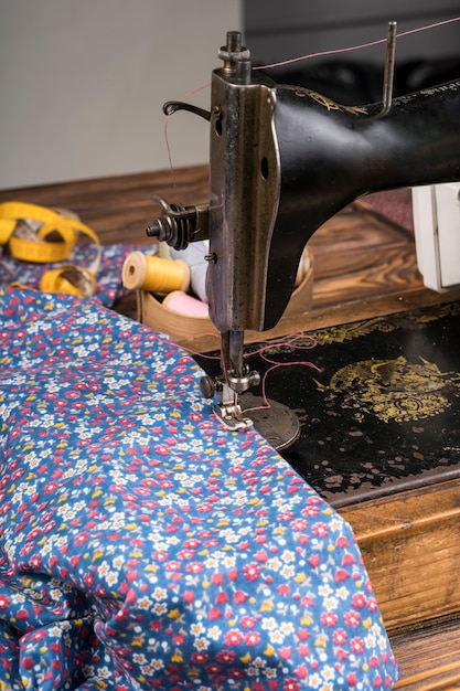 Sewing machine with flower patterned material