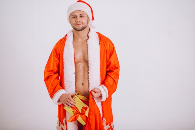 Free photo sexy santa man isolated on white background