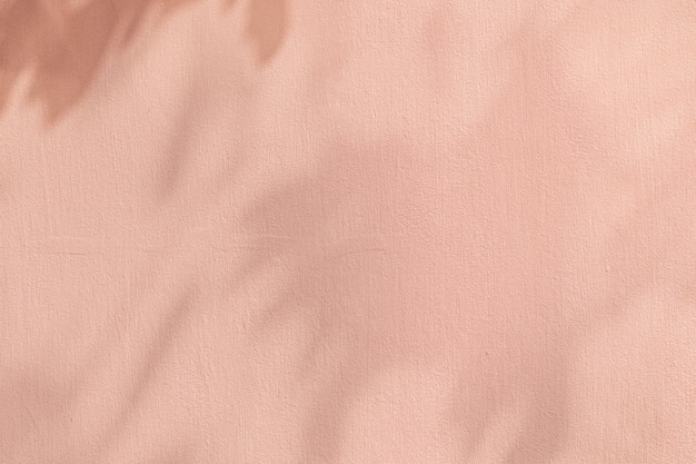 セメントの質感と影のピンクの背景