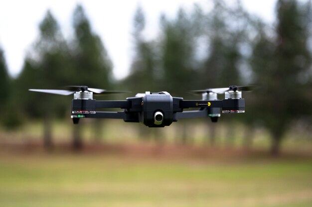 Shallow focus shot of a drone flying at the ranch in California