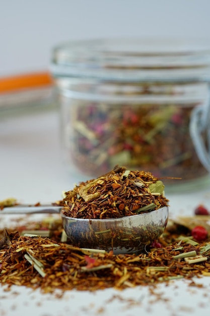 Shallow focus shot of Rooibos tea isolated on a white background