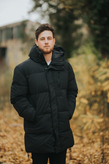 Shallow focus shot of a young and attractive male posing at camera