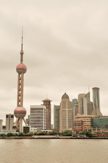 Shanghai architecture over river in overcast day