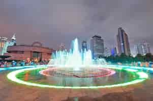 Free photo shanghai people's square with fountain and urban skyline at night
