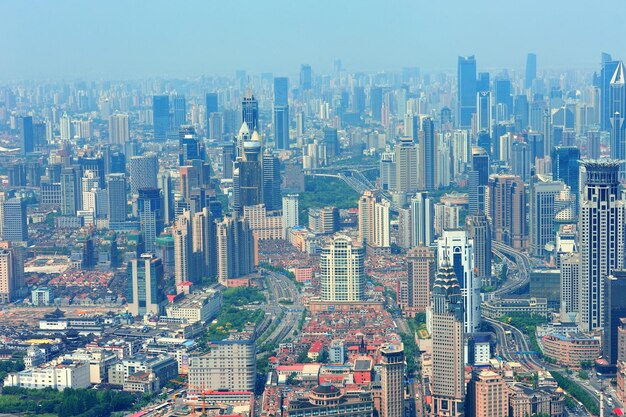Shanghai urban city aerial view with skyscrapers.