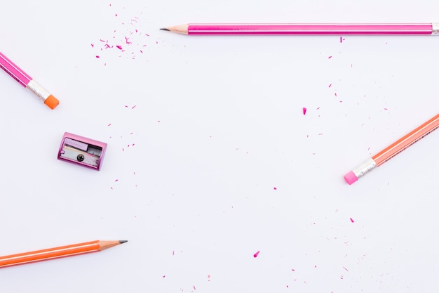 Sharpener lying near graphite pencils