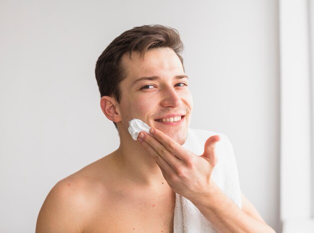 Shaving concept with attractive man